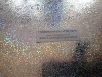Holografisch papier met opdruk Hulstblaadjes zilver